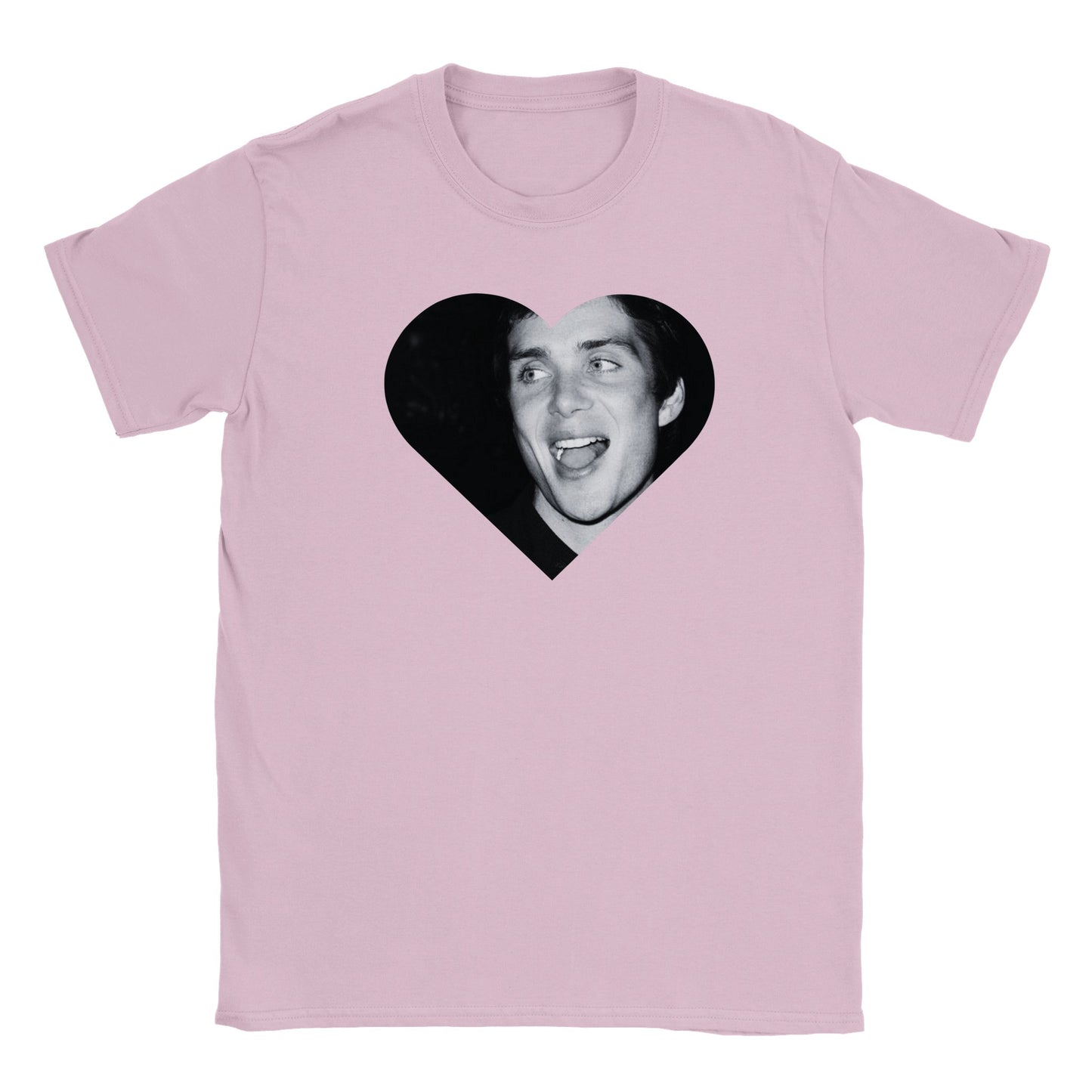 plain light pink white t-shirt with a heart motif. Inside the heart is a black and white image of cillian murphy smiling with gum in his mouth