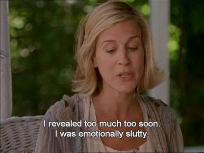 A screenshot of the tv series sex and the city with the character carrie bradshaw saying "I revealed too much too soon. I was emotionally slutty". Carrie is a white woman played by actress Sarah Jessica Parker, she has a blonde short hairstyle and grey cardigan.